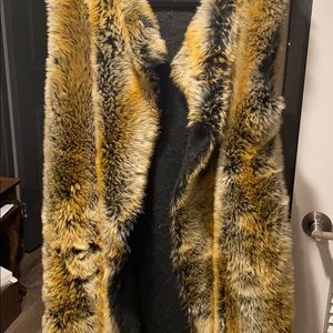 Knee length faux fur vest